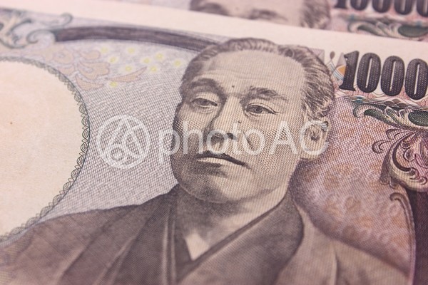 一万円札のアップ 一万円札のアップの写真