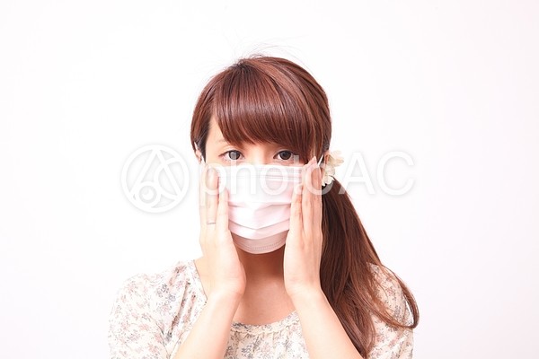 マスクを着けた女性1 マスクを着けた女性1の写真