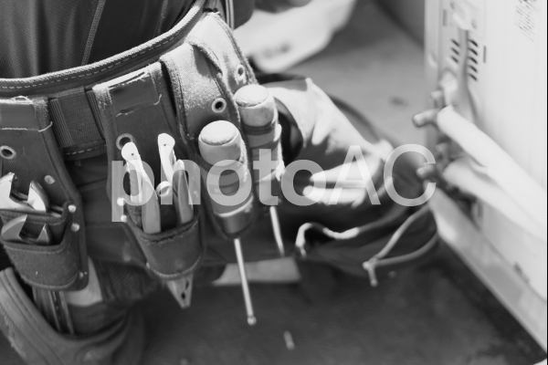 腰に巻かれた工具一式 腰に巻かれた工具一式の写真