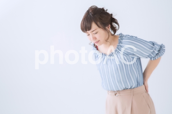 腰痛の女性 腰痛の女性の写真