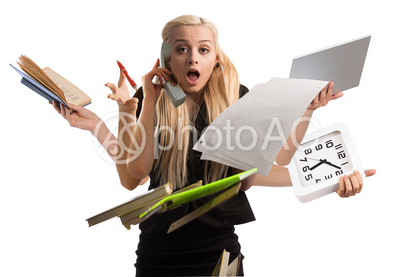 忙しくて焦る女性 忙しくて焦る女性の写真
