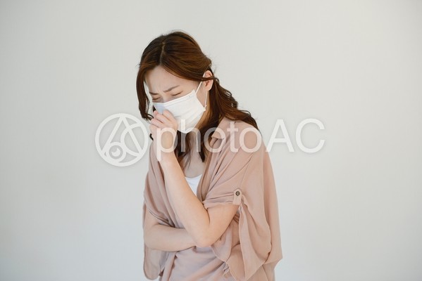 マスクをした女性1 マスクをした女性1の写真